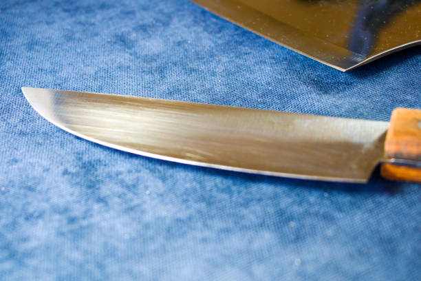 istock Kitchen knives collections on the blue background, tools and instruments for cooking. 1267490082
