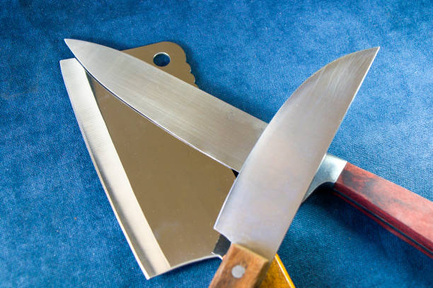 istock Kitchen knives collections on the blue background, tools and instruments for cooking. 1267490095