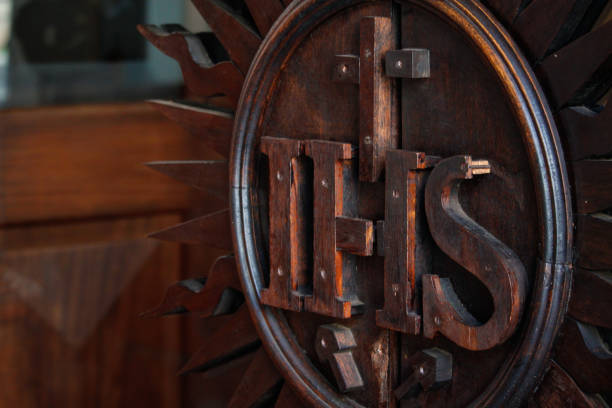 IHS Iesus Hominum Salvator (Jesus savior of the world)