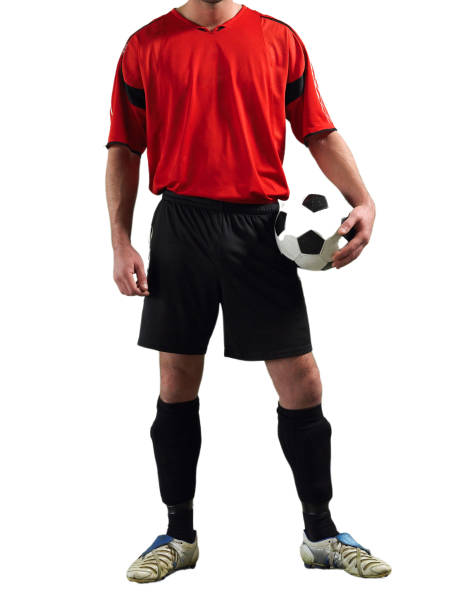 istock Cropped Soccer Player holding football in studio 1267492661