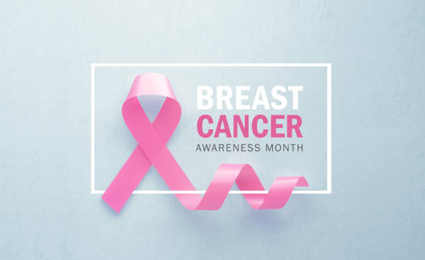 cinta de concientización sobre el cáncer de mama rosa sentada junto al mensaje del mes de concientización sobre el cáncer de brest sobre el fondo gris - cinta contra el cáncer de mama ilustraciones fotografías e imágenes de stock