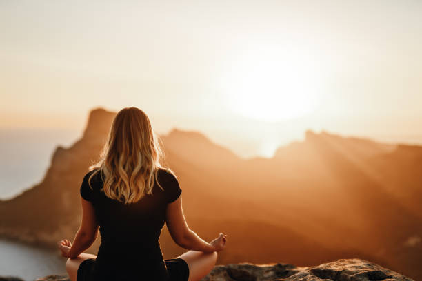 istock Meditating girl in the mountains 1267497999