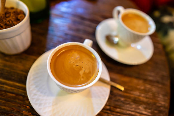 istock Hot Esspresso coffee on wooden table 1267505052