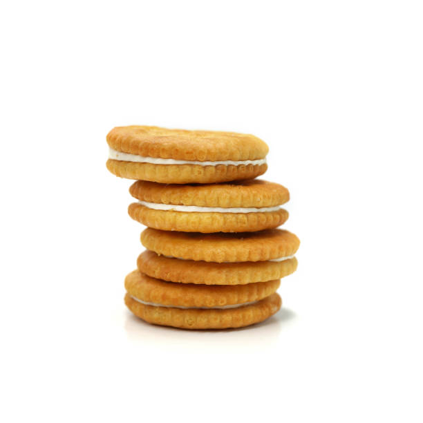 istock Close-Up Of Biscuits Against White Background 1267506821