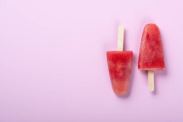 istock Watermelon ice cream on a pink table. Copy space 1267510301