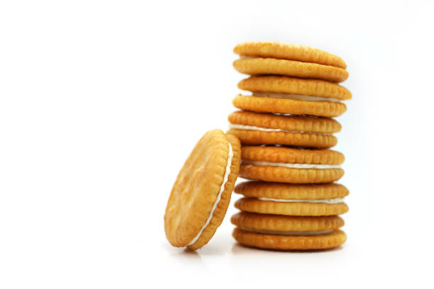 istock Close-Up Of Biscuits Against White Background 1267511660