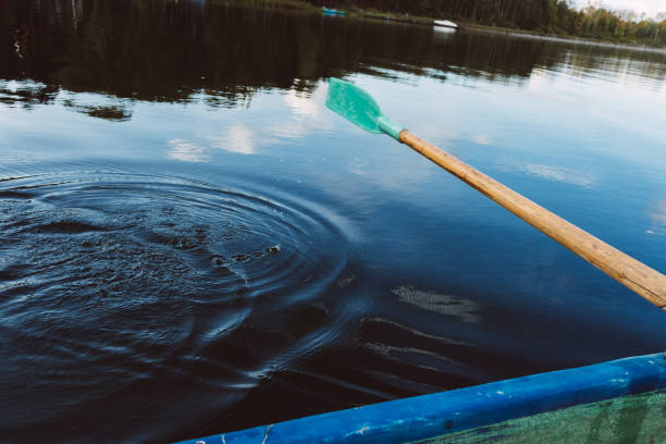 istock Long paddle on the water in the autumn lake 1267513364
