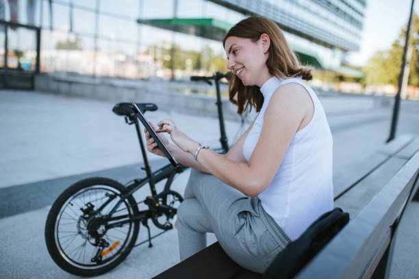 istock A young woman is resting outside after working hours 1267513562