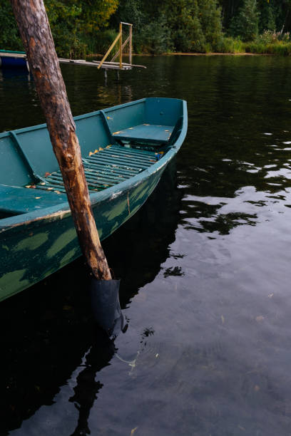 istock Moored boats in the autumn lake 1267514231