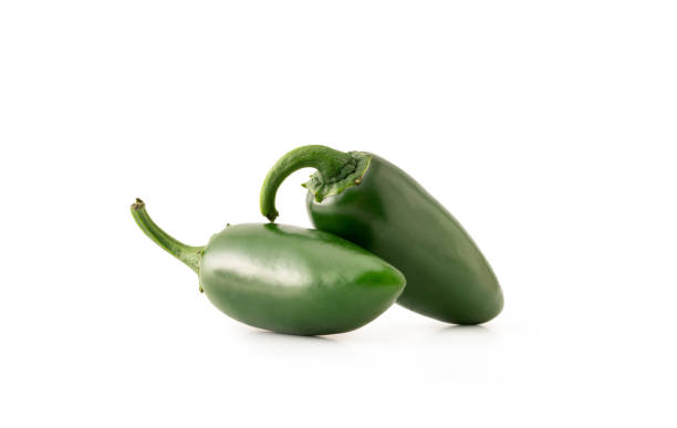 istock Chili Peppers on White Background 1267519544