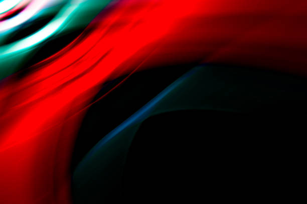 istock Abstract colorful lines on black background 1267520325