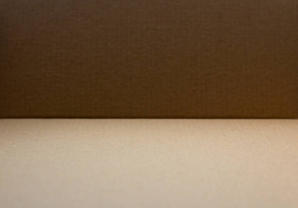 istock Cardboard wall and floor Brown paper background 1267520538