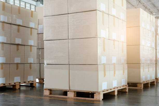 istock Shipment, Carton boxes, Cargo freight, Manufacturing warehouse storage. Stack of cardboard boxes or package goods for delivering to a customer. 1267520594