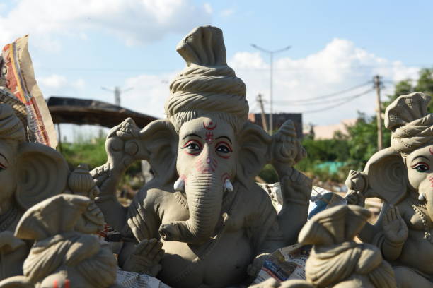 Idol of Indian God Ganesha made out of clay Clay statues of Indian elephant god Ganesha on display during the Hindu festival of Ganesh Chaturthi sabby stock pictures, royalty-free photos & images