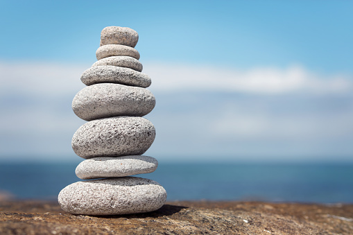 Pebble stone stack background signifying harmony and balance
