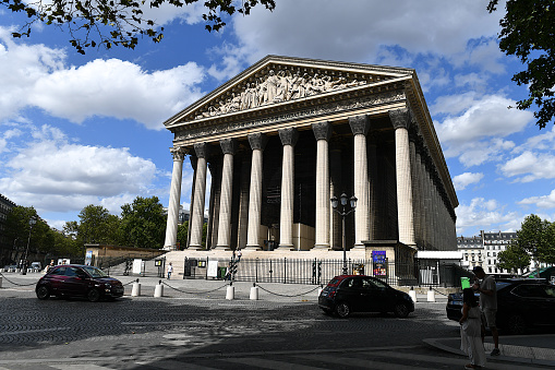 Paris, France-08 21 2020:L'église de la Madeleine is a Roman Catholic church occupying a commanding position in the 8th arrondissement of Paris.The Madeleine Church was designed in its present form as a temple to the glory of Napoleon's army.