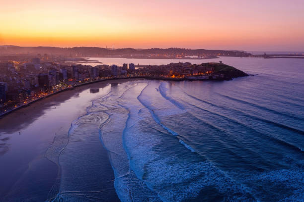Gijon downtown and San Lorenzo beach aerial drone view stock photo