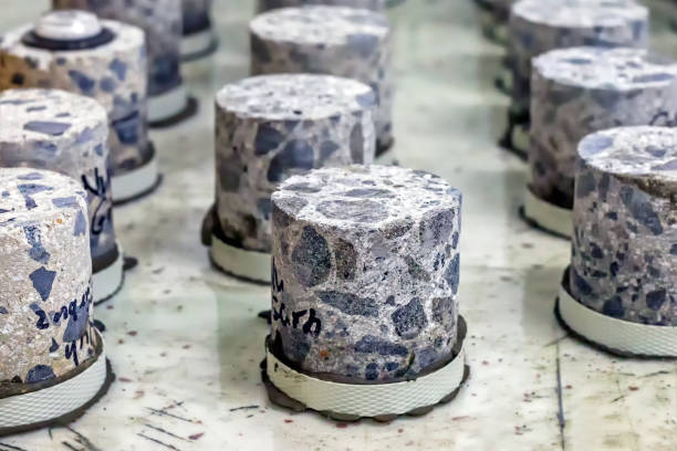 istock View of the cylindrical concrete core samples of the tensile or flexural testing (compressive strength test). 1267528348