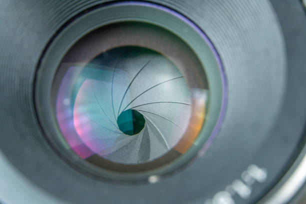 istock Closed camera lens aperture, macro photography. Macro camera lens 1267528509