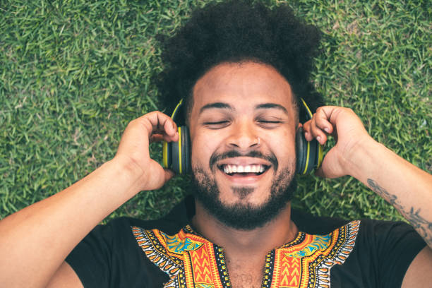 istock Happy man listening to music 1267536633