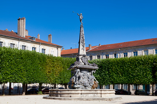 Nancy, France - June 24 2020: The fountain of the Place d'Alliance by the Bruges sculptor Paul-Louis Cyfflé was inaugurated in 1756 to commemorate a treaty of alliance between France and Austria that ended more than 250 years of open conflict.