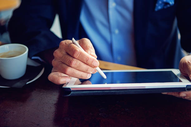 istock Businessman is working with digital tablet 1267540379
