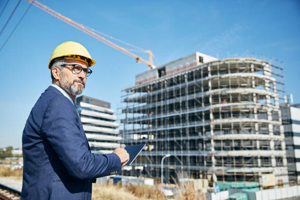 istock senior businessman architect helmet construction site building architecture 1267542700
