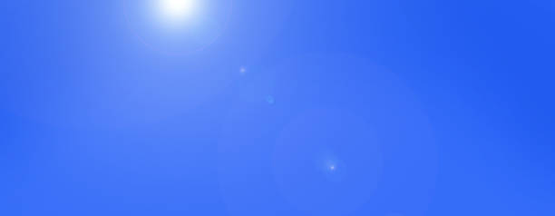 istock Summer background with a magnificent summer sun burst with lens flare. 1267545846