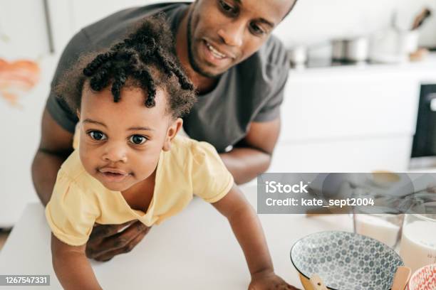Dad Taking Care Of His Baby At Home Stock Photo - Download Image Now - 30-34 Years, Adult, African-American Ethnicity