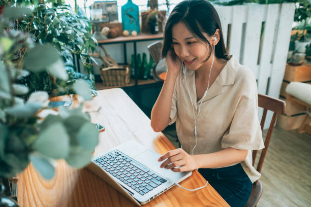 istock asian woman working at home 1267547702