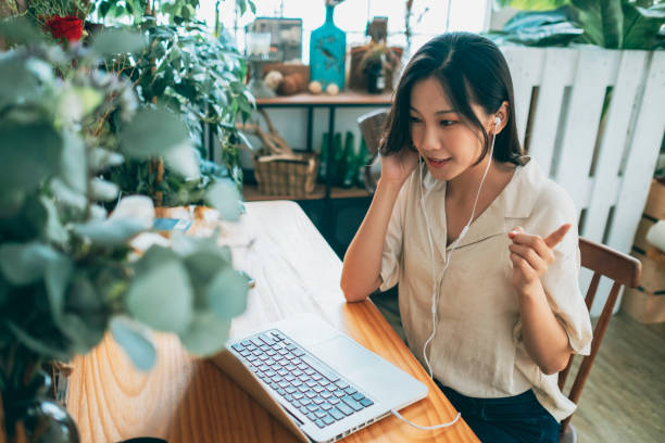 istock asian woman working at home 1267547745