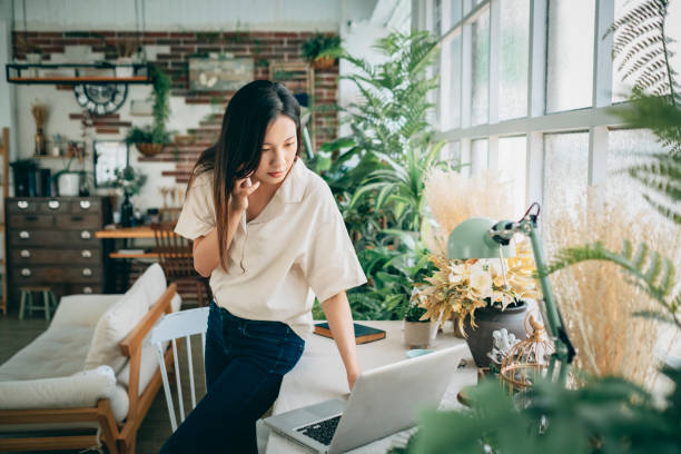 istock asian woman working at home 1267548400