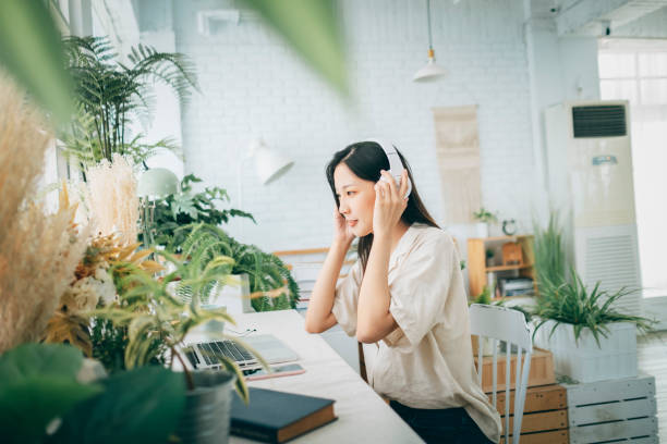 istock asian woman working at home 1267548917