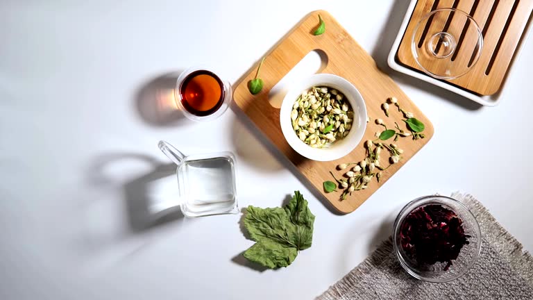 herbal, asian tea with dry flower petals for the tea ceremony. Flat lay, copy space for text