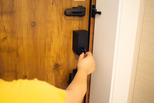 istock A woman locking the door 1267549311