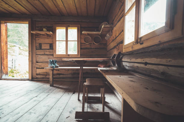 mountain hut in austria: rustic wooden interior - home interior cabin shack european alps imagens e fotografias de stock