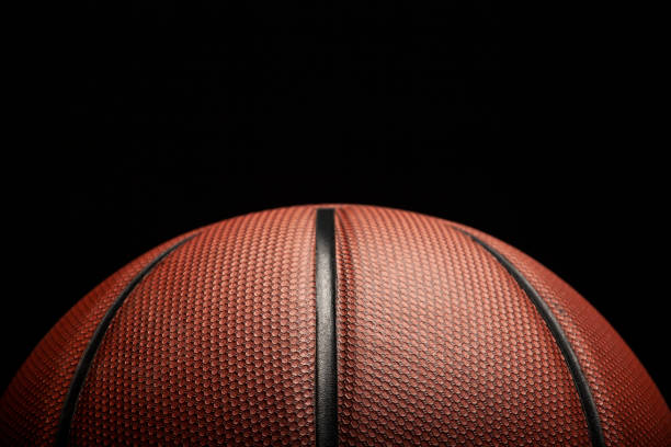image of basketball dark background - basketball imagens e fotografias de stock