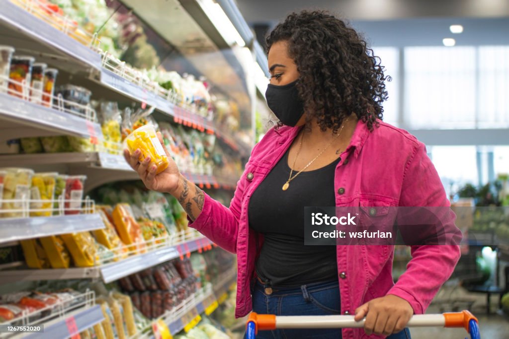 Brazilian woman in a supermarket Photo of a brazilian woman in a supermarket. Supermarket Stock Photo