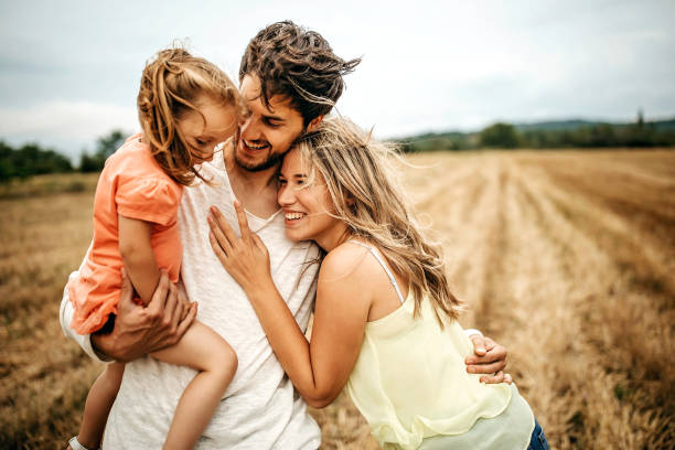 istock Family sharing love in sunset 1267553245