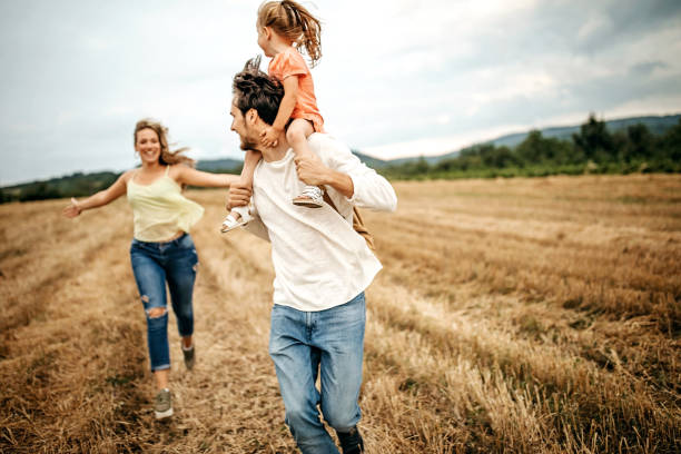 istock Family sharing love in sunset 1267554405