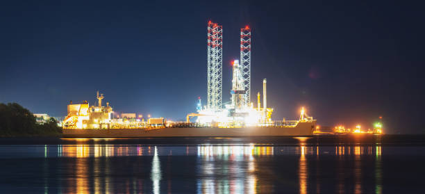 istock Jackup Offshore Oil Rig & Tanker Ship 1267556222