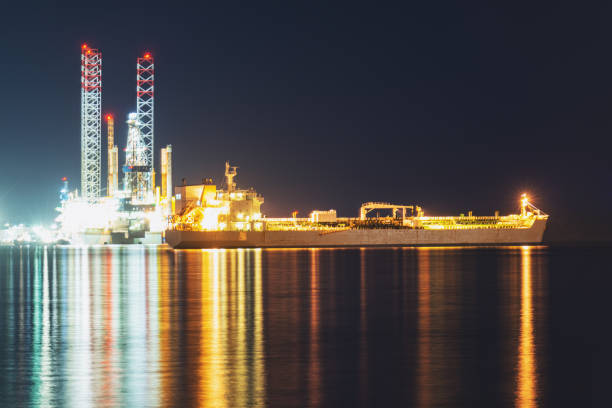 istock Jackup Offshore Oil Rig & Tanker Ship 1267556245
