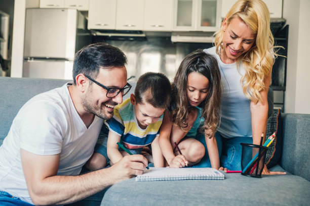 istock Young happy family drawing 1267558728