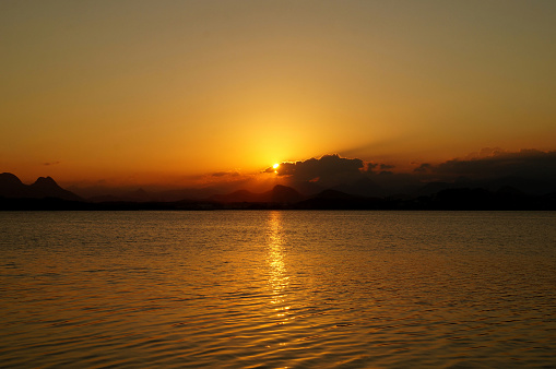 sunset on lake, imboassica lagoon, macae, rio de janeiro, brazil