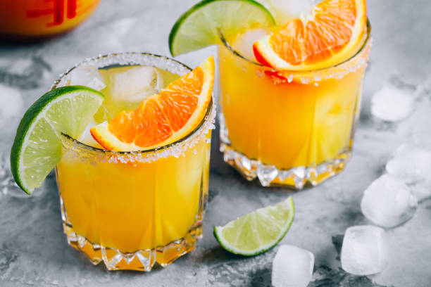 istock Orange Lime Margarita. Refreshing summer drink with ice 1267563631