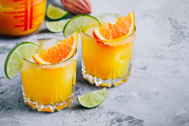 istock Orange Lime Margarita. Refreshing summer drink with ice 1267563690