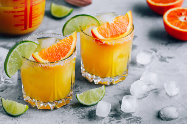 istock Orange Lime Margarita. Refreshing summer drink with ice 1267563773