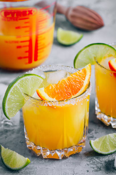 istock Orange Lime Margarita. Refreshing summer drink with ice 1267563843