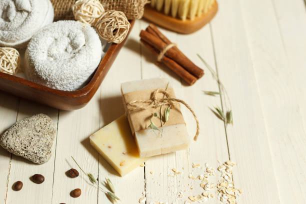 Handmade soap with natural ingredients and Spa items on a light table. Close up stock photo