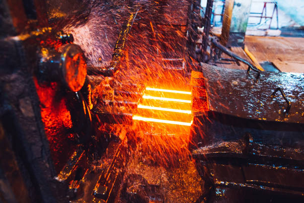 istock hot steel on conveyor in a steel mill 1267568407